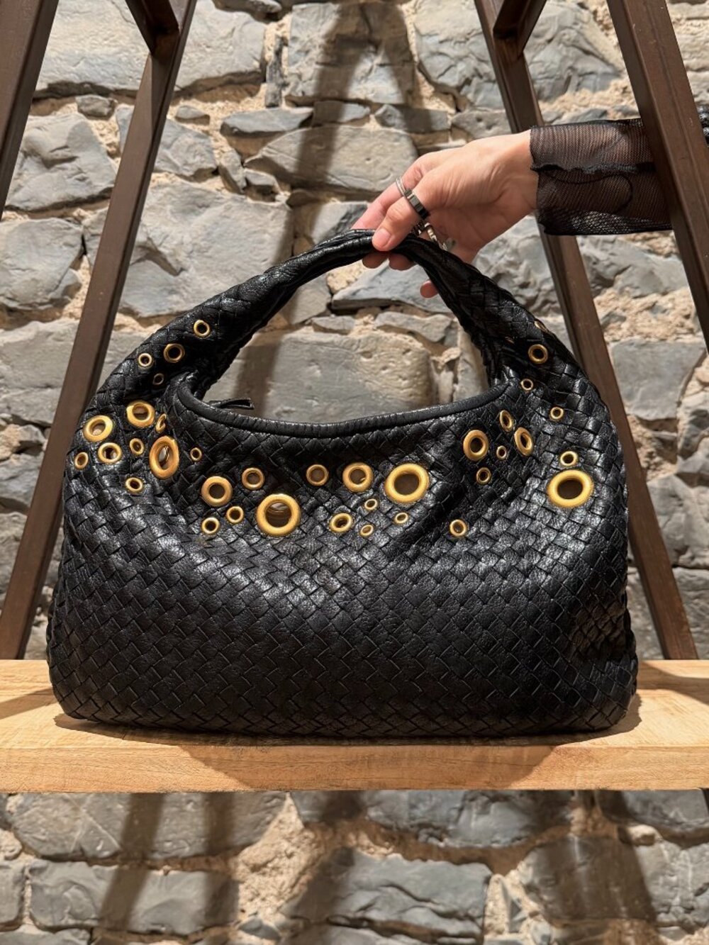 Bottega Veneta Black Intrecciato Grommets Embellished Hobo Bag